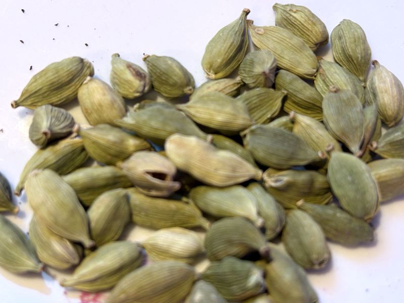 Close-up of green cardamom pods
